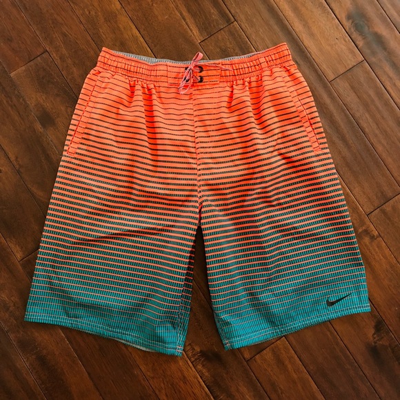 orange nike swim trunks